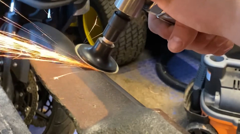 Sharpening a lawn mower blade with a die grinder