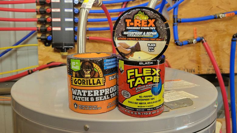 Flex, Gorilla, and T-Rex waterproof tapes on top of a water heater