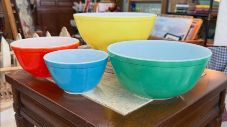 A four-piece set of Pyrex primary colors mixing bowls