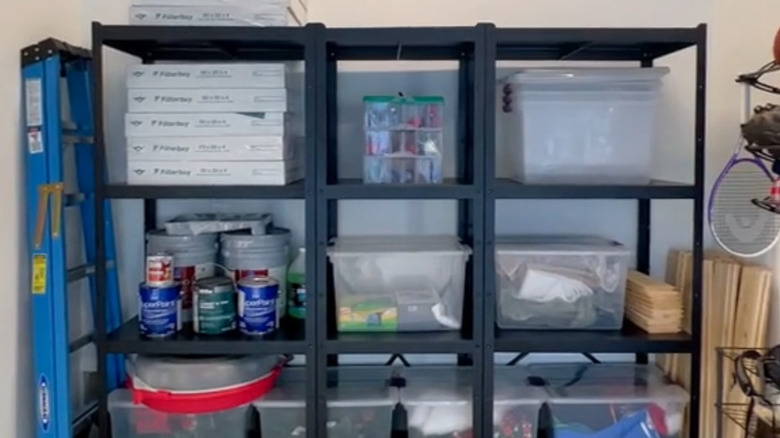 BROR shelving unit with filled up shelves in a garage