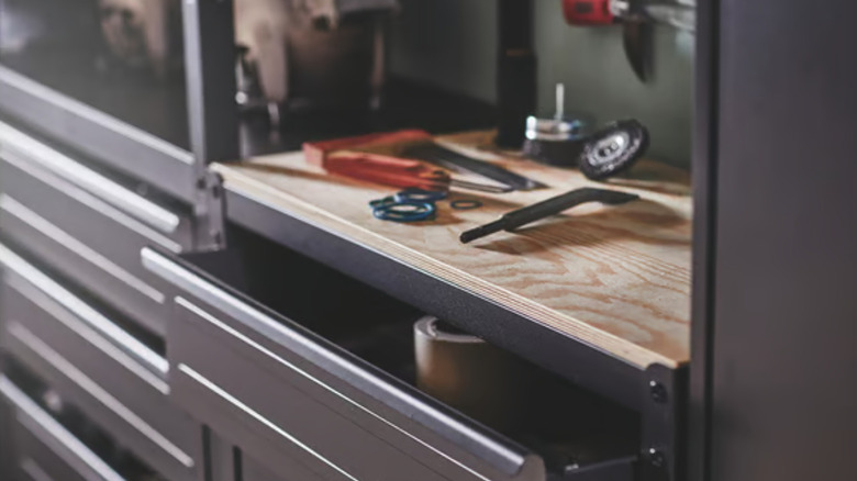 IKEA workbench with tools on its wood surface.