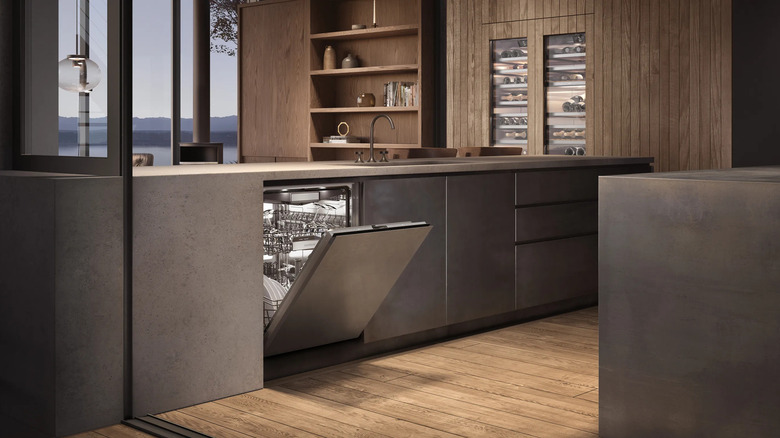 modern kitchen with Gaggenau panel ready dishwasher and glass door beverage fridge