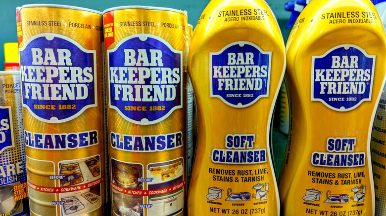 Four containers of Bar Keepers Friend on shelf