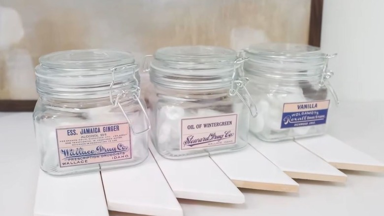 Dollar Tree glass jars turned into labeled containers for pantry