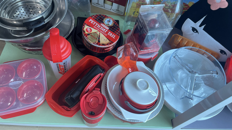 variety of antique glassware and dishes at thrift store