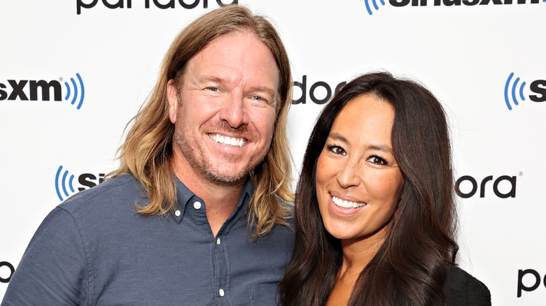 Chip and Joanna Gaines smiling for a photo