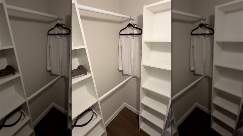 IKEA BILLY bookshelves used as custom cabinet storage and the supports for clothing rails