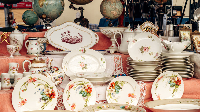 Dishware on sale at a flea market.