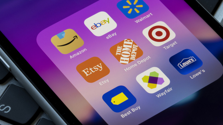 a phone screen showing the icons of major online furniture retailers.