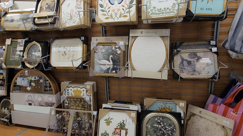 collection of pictures frames and art on sale at TJ Maxx