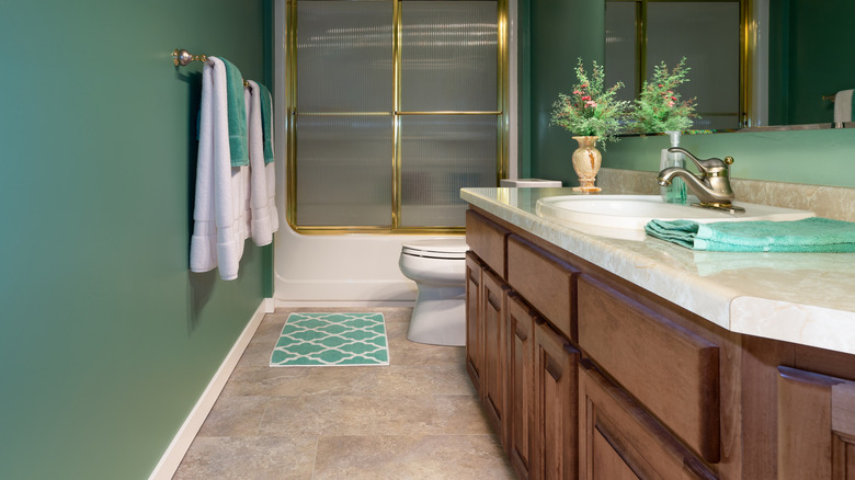 remodeled bathroom with luxury vinyl tile flooring