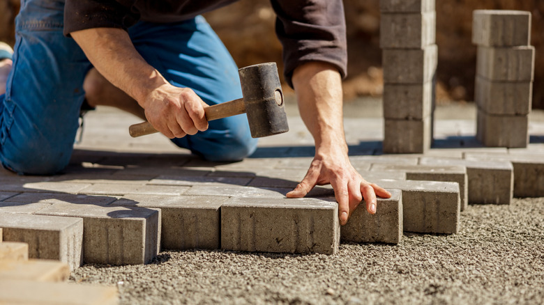 installing pavers on solid compact gravel base