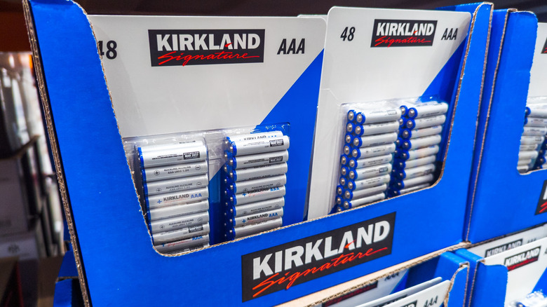 Kirkland Signature batteries on display at a Costco store