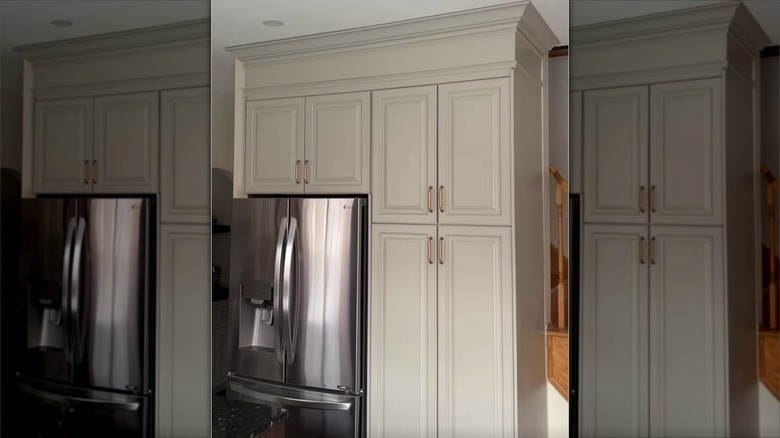 Kitchen cabinets and stainless steel fridge