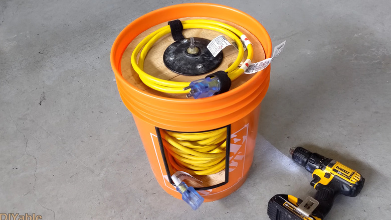 A cord reel built into a five-gallon bucket