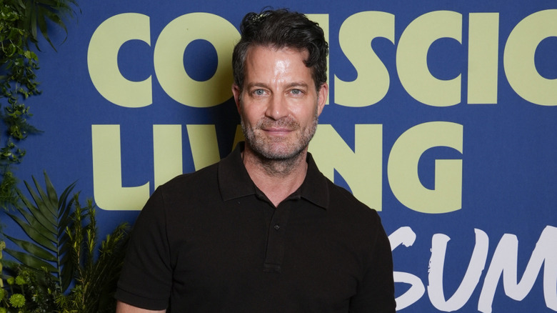Nate Berkus slightly smiling and wearing a black polo shirt.