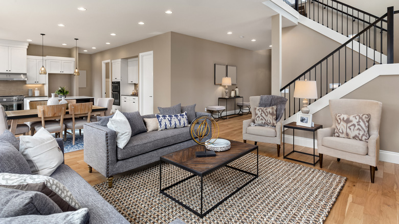 Open concept layout with brown paint on all walls.