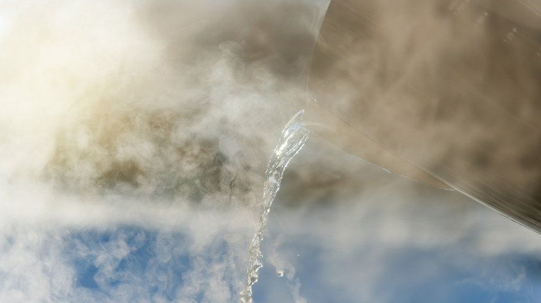 Hot water and vinegar solution creating steam