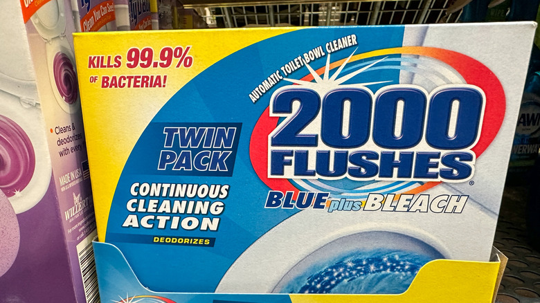 A box of 2000 Flushes on a store shelf
