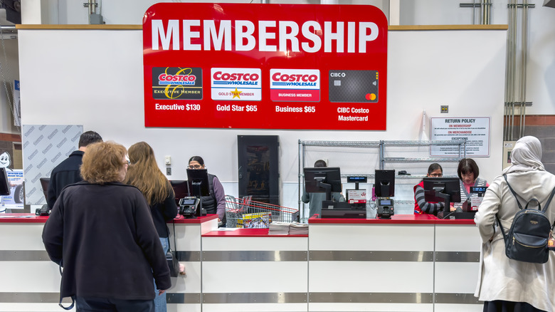 People line up to purchase a membership at Costco