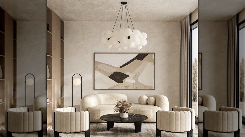 Modern narrow living room where the beige wall treatment is carried onto the ceiling to make it appear taller