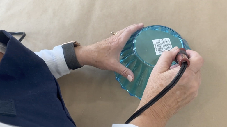 Person doing DIY with Dollar Tree bowl