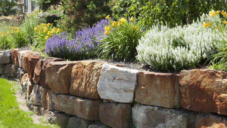 A natural stone retaining wall.