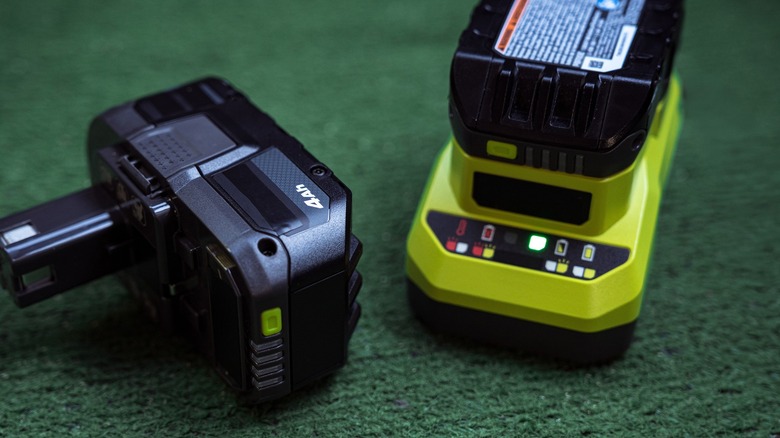Closeup of Ryobi batteries and a battery charger
