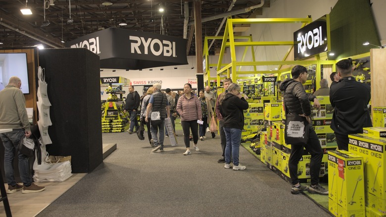 Shoppers checking out deals in the Ryobi tool aisle