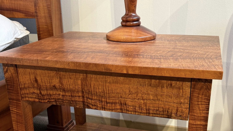 Koa nightstand next to bed set