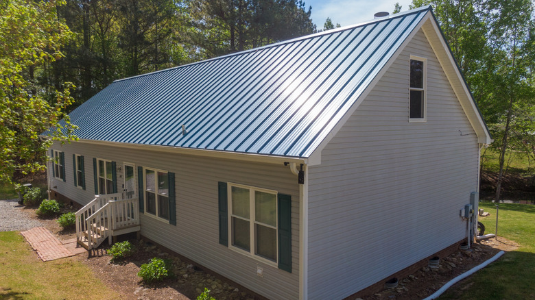 metal seam and fasteners roofing on upgraded home