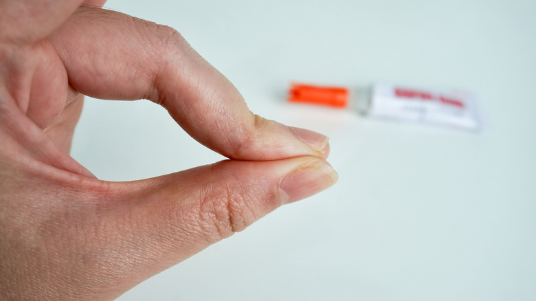 fingers stuck with super glue