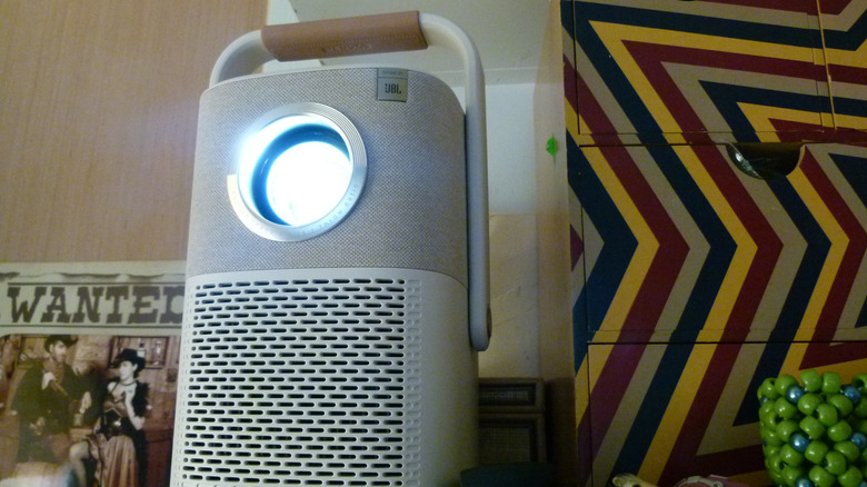 Projecting from the T2, perched on a bedroom bookshelf