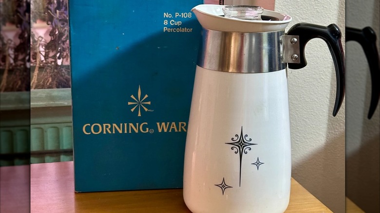 A Corningware percolator with the starburst pattern and box