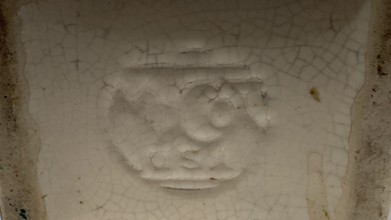 A McCoy maker's mark stamped on the bottom of a piece of pottery