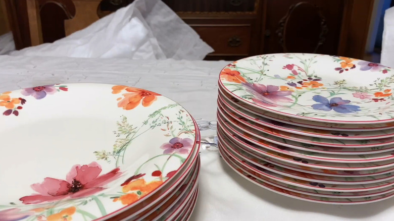 Floral Villeroy and Boch dishware on a white table setting