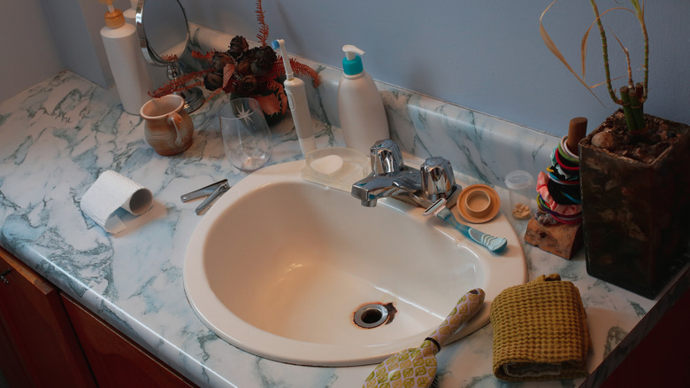 Cluttered bathroom counter