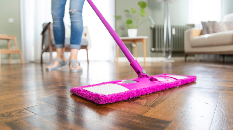 Woman cleaning floors