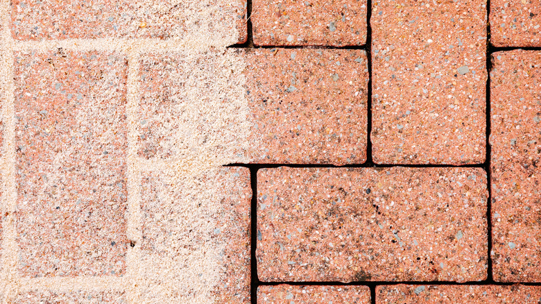 using sand to fill gaps between pavers