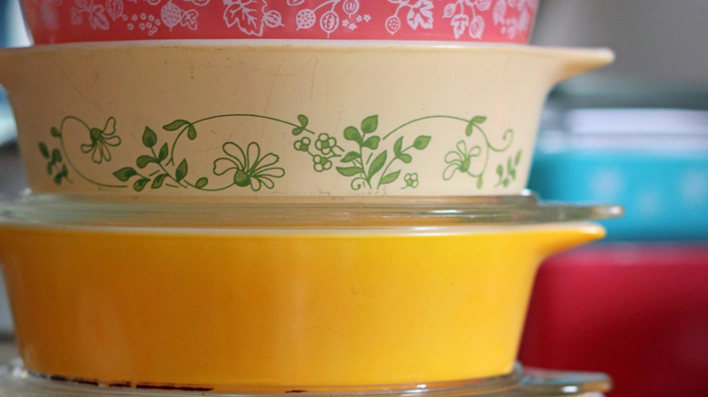 Vintage Pyrex dishes stacked on top of each other.