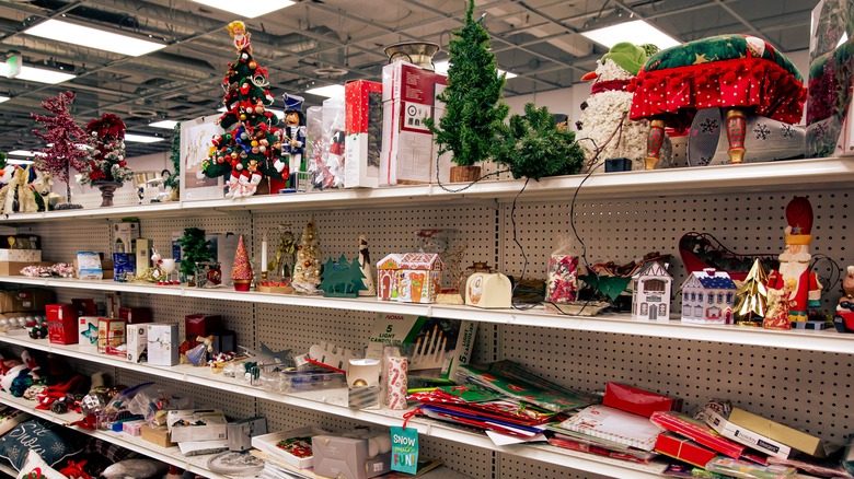 Christmas decorations on thrift shop shelves