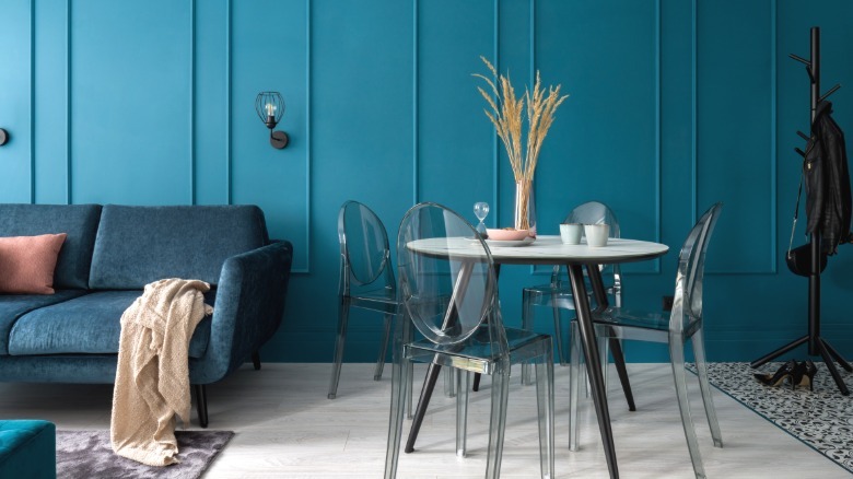 woman showing how neutral colors pair with teal