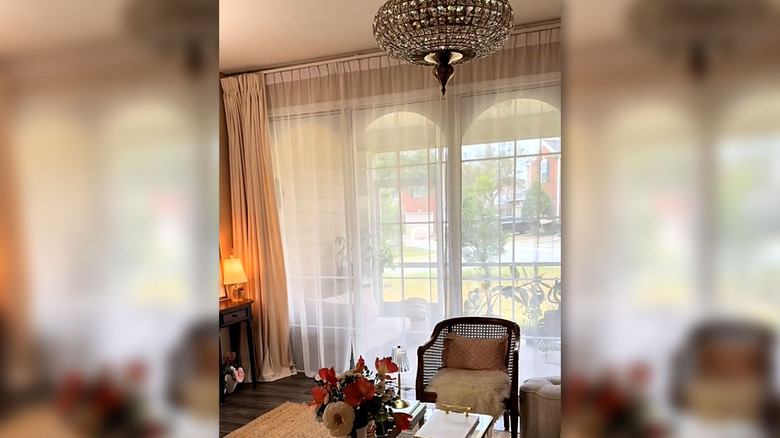 Sliding glass doors with white sheers