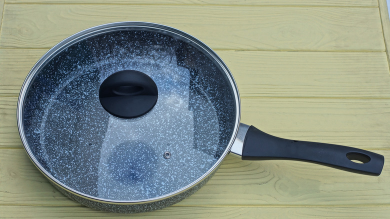 The Stunning Way To Turn An Old Pot Lid Into Decorative Countertop Storage