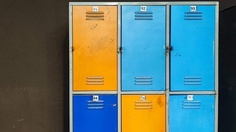 Blue and orange lockers with scratches
