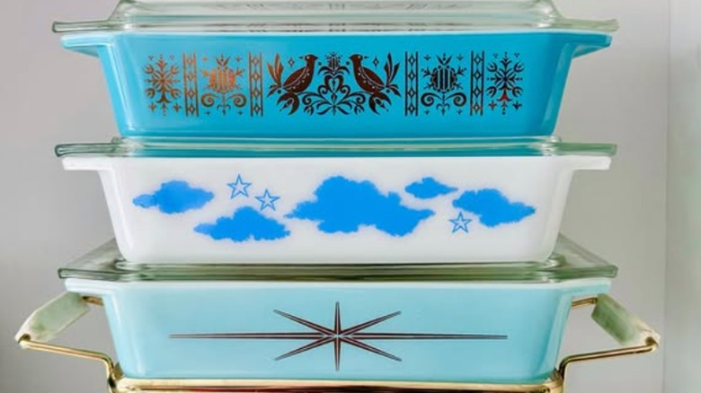 A trio of Pyrex space-saver casseroles, with Turquoise Birds on top