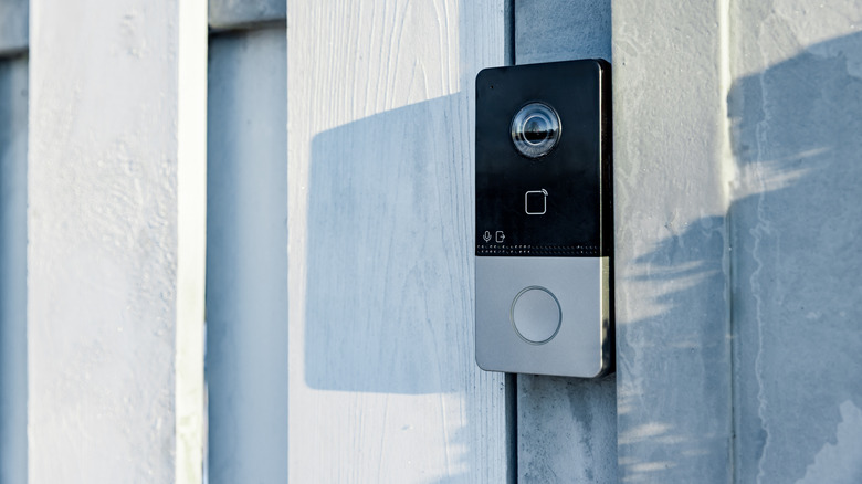 Video doorbell on exterior fence