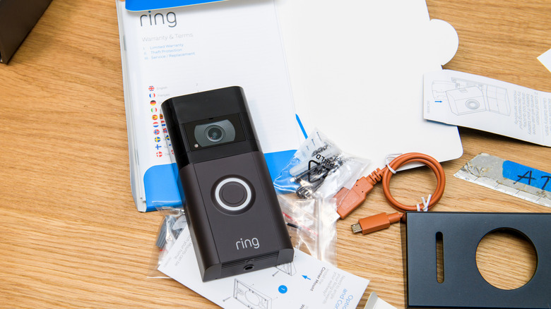 Unboxed video doorbell sitting on table