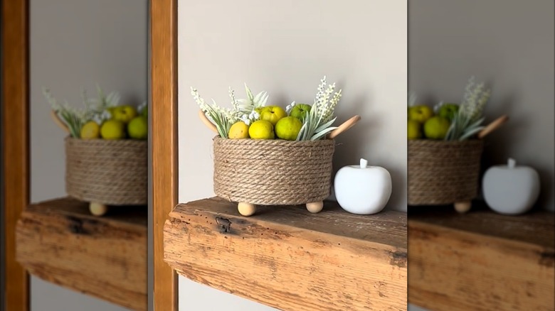 DIY project tutorial transforming cookie tin to jute rope covered basket with plants and fruit