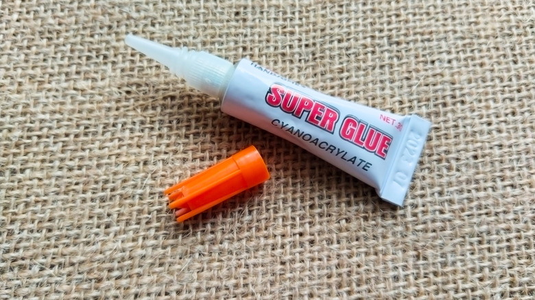 close up of open tube of super glue